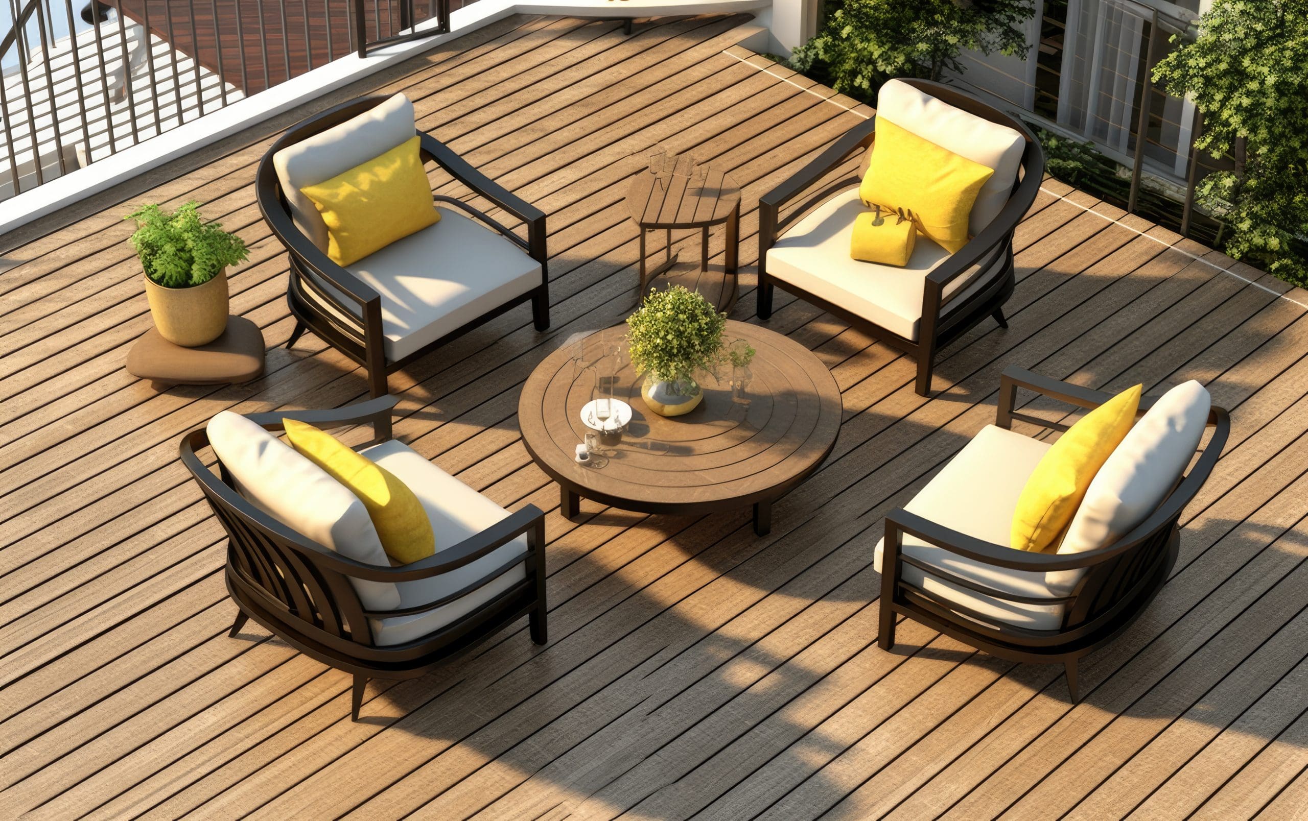 A rooftop deck with four cushioned armchairs arranged around a wooden circular table. Each chair has a yellow pillow. A small plant sits beside the chairs, and the table has decorative items and a plant.